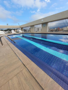 Flat Completo Novo a 350m da praia com piscina